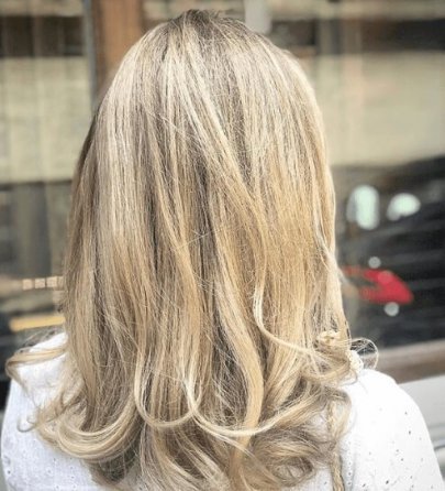 Kapsels 2019 halflang blond